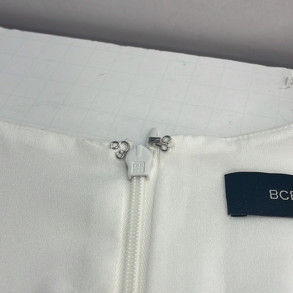 BCBGMaxAzria off-white peplum top size xs 0/2 - Picture 5 of 5